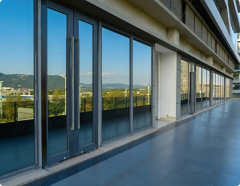 Modern building with floor-to-ceiling glass windows Carlow