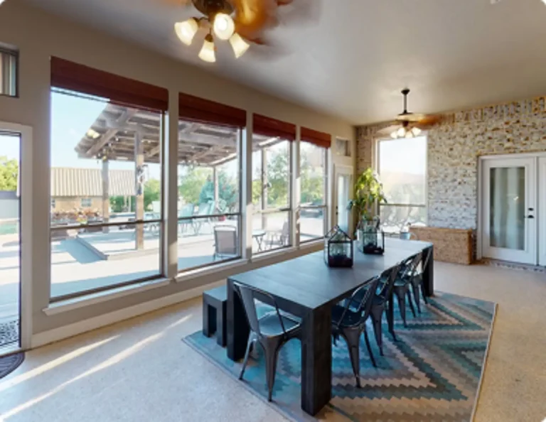 Sunroom with large glass windows overlooking the water Carlow